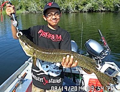 Youth Fishing for BIG Northern Pike at Fireside Lodge in Canada