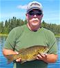 Rich with Trophy Smallmouth Bass Fishing at Fireside Lodge in Canada
