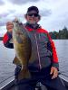 Hog Trophy Smallmouth Bass by TV Babe Winkelman at Fireside Lodge in Canada