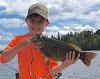 10-Year Old Fishing Trophy Smallmouth Bass at Fireside Lodge in Canada