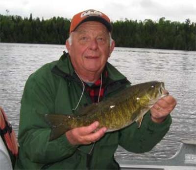 lodge with boats and smallmouth fishing