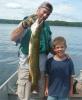 father and son fishing northern pike Canada